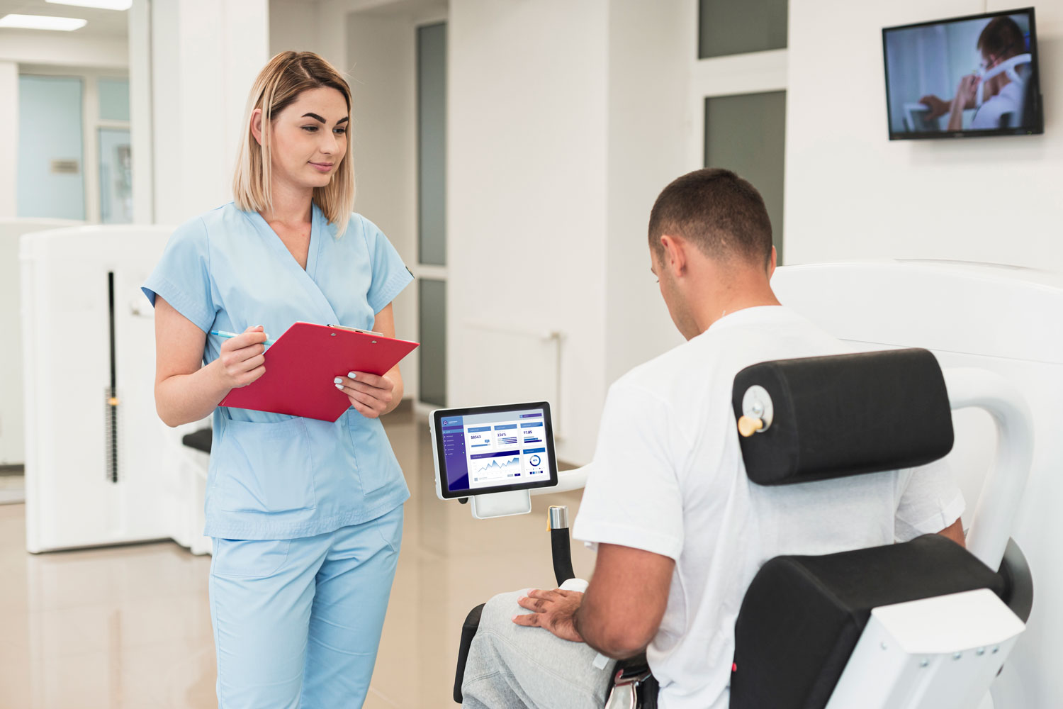 Chiropractor discussing a treatment plan with a patient